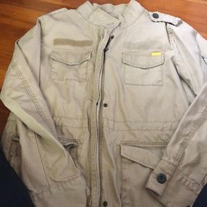 Tan thin layer utility jacket